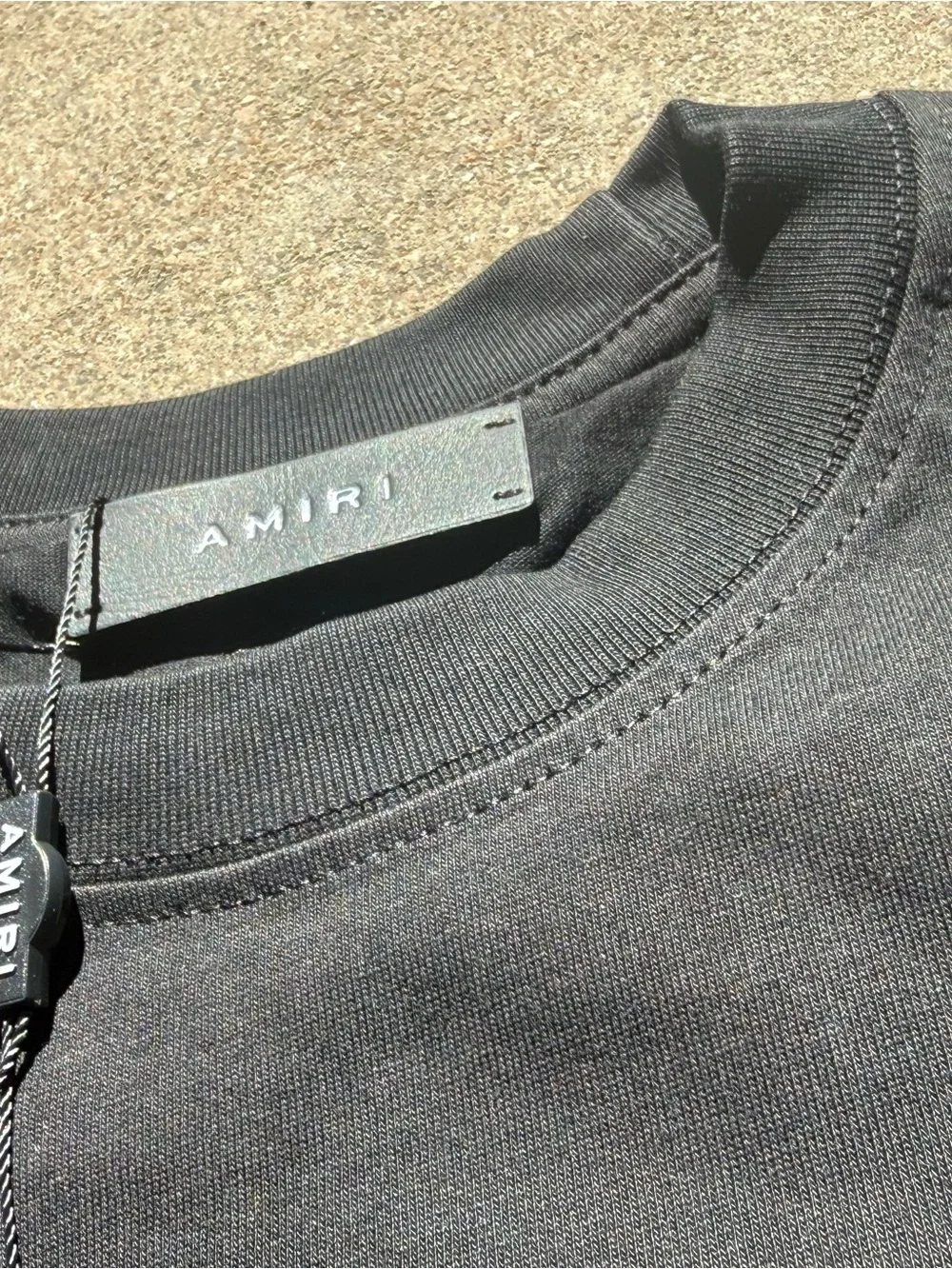 AMIRI Black T‑Shirt with Teal Crest Logo